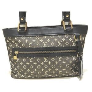 Louis Vuitton Lucile Monogram Mini Canvas Leather Handbag